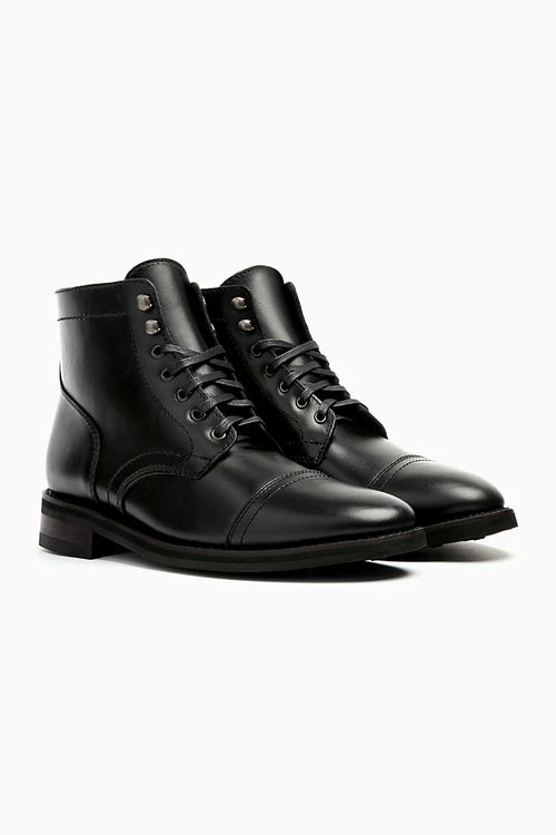 Black leather lace-up boot