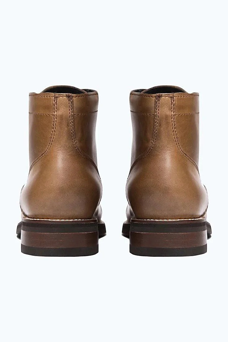 Goodyear welted boot with cork-bed midsole