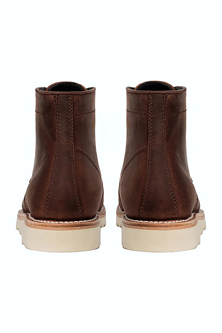 Dusty red-brown boot on rubber wedge outsole