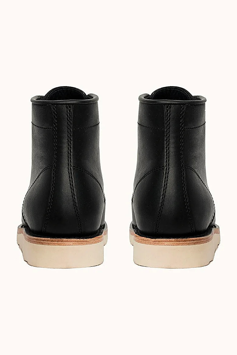 Black wedge sole work-style boot