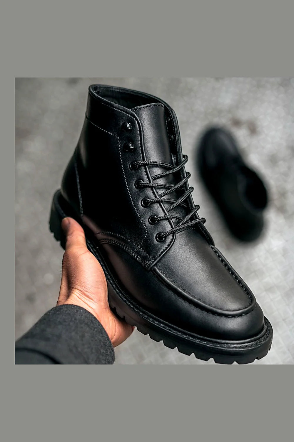 Black lug moc toe boot