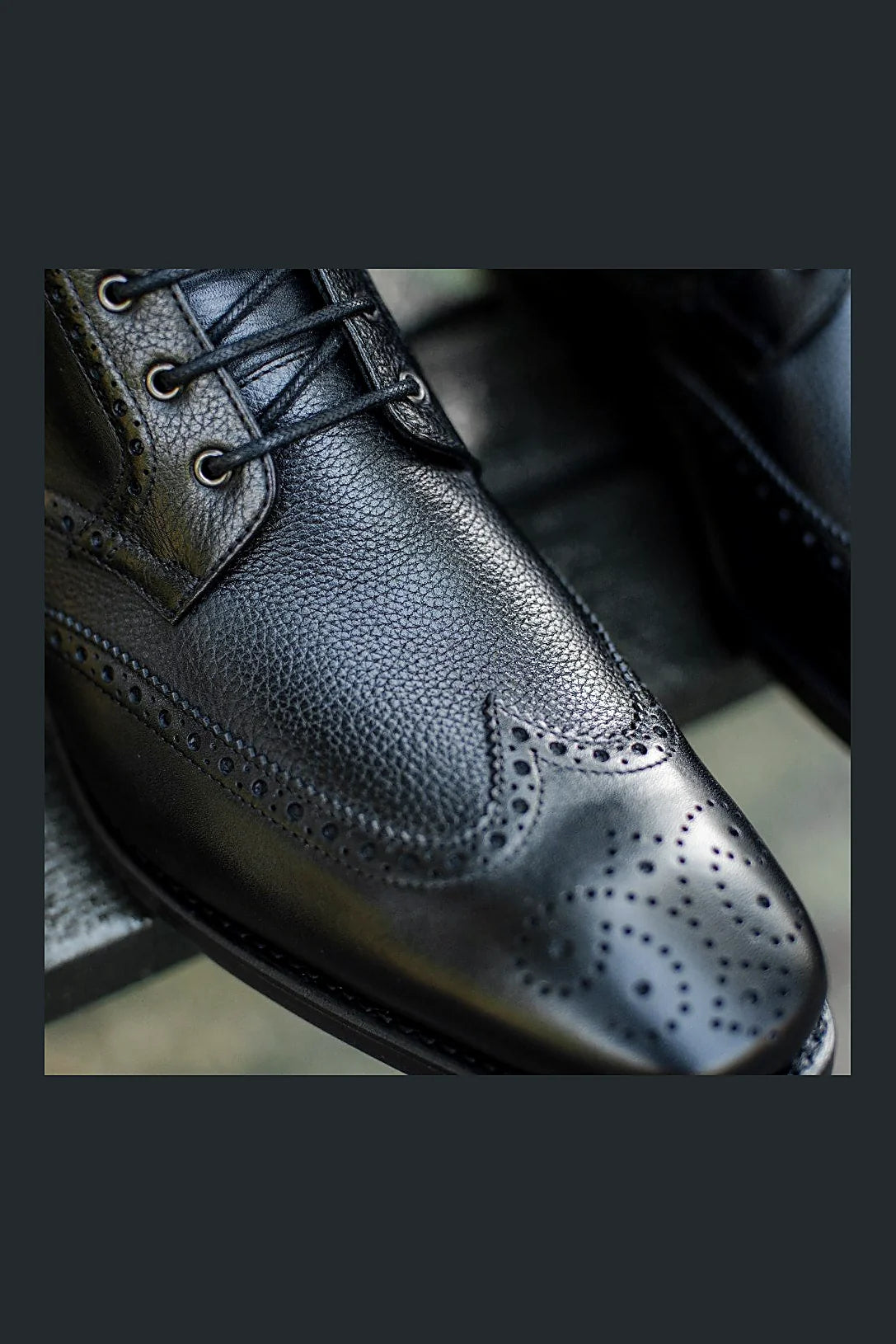 Black brogue boot
