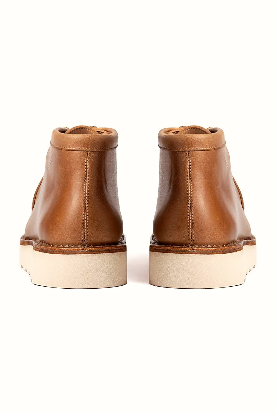 Moc toe boot with gusseted tongue