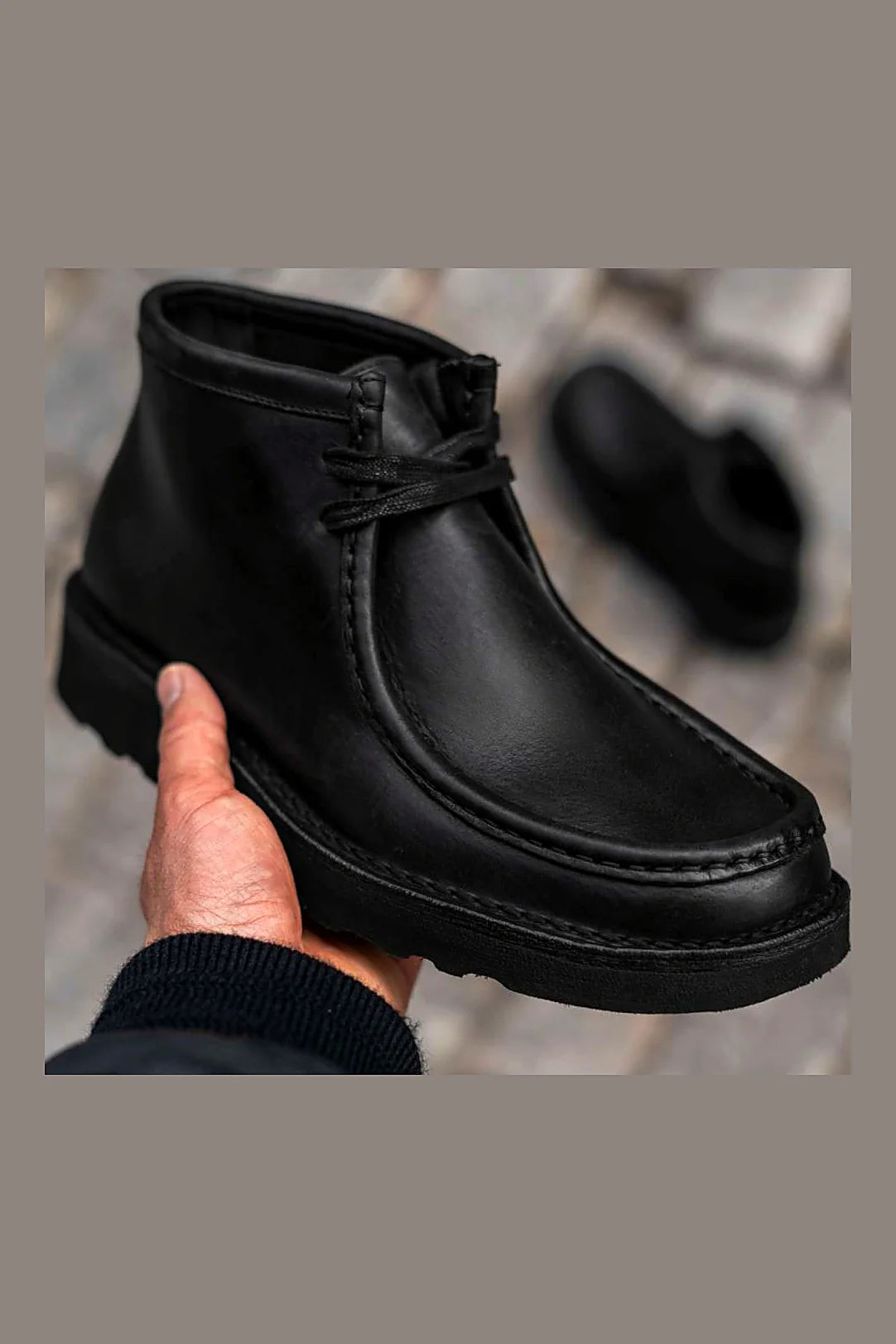 Black moc toe boot