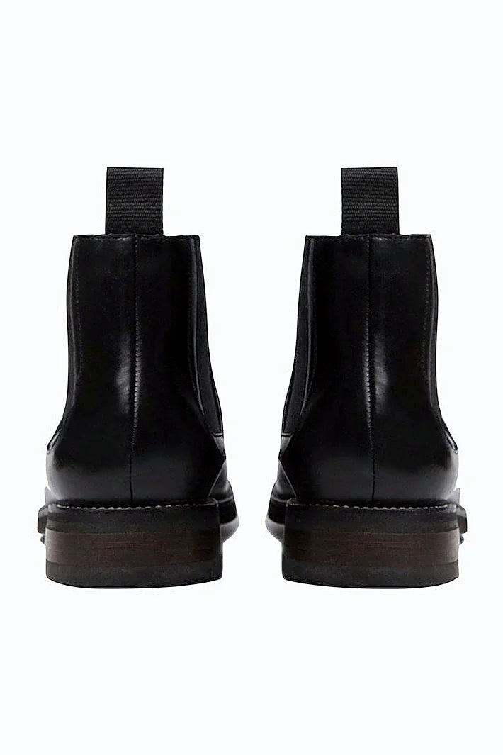 Streamlined black boot silhouette