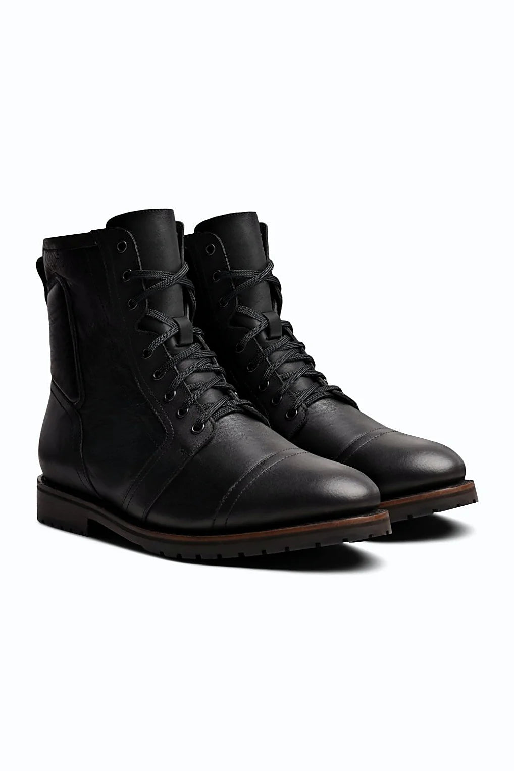 Black full-grain zip boot with lug outsole