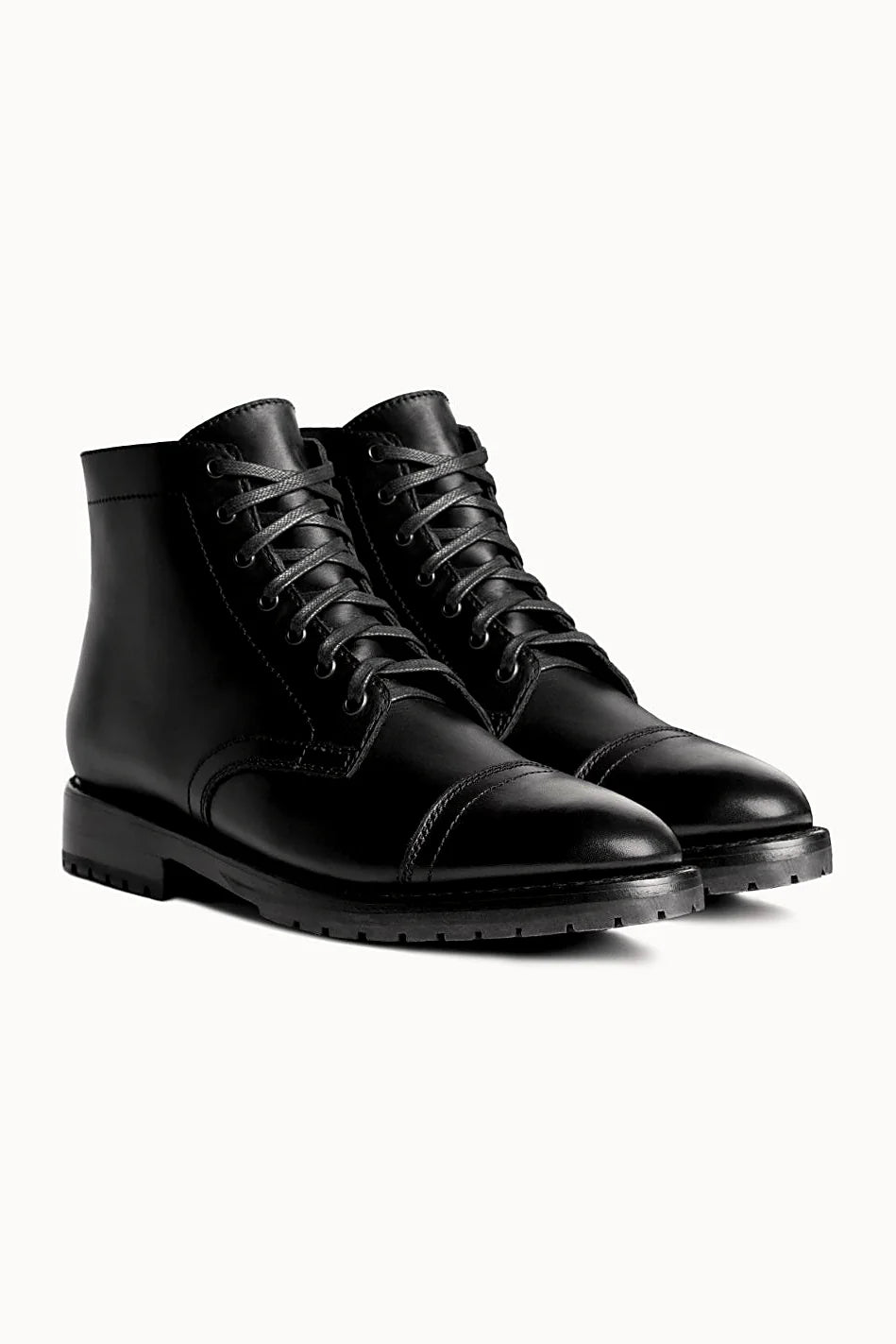Lug sole boot in black leather