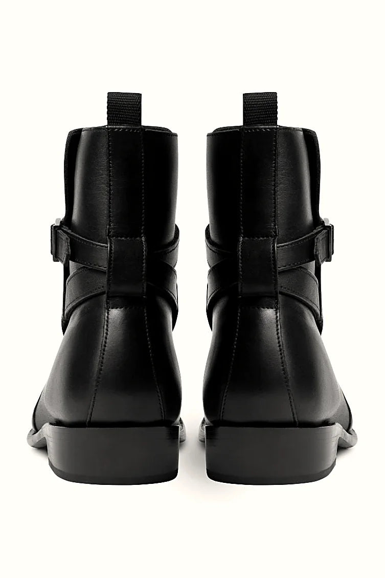 Black buckle boot with leather outsole