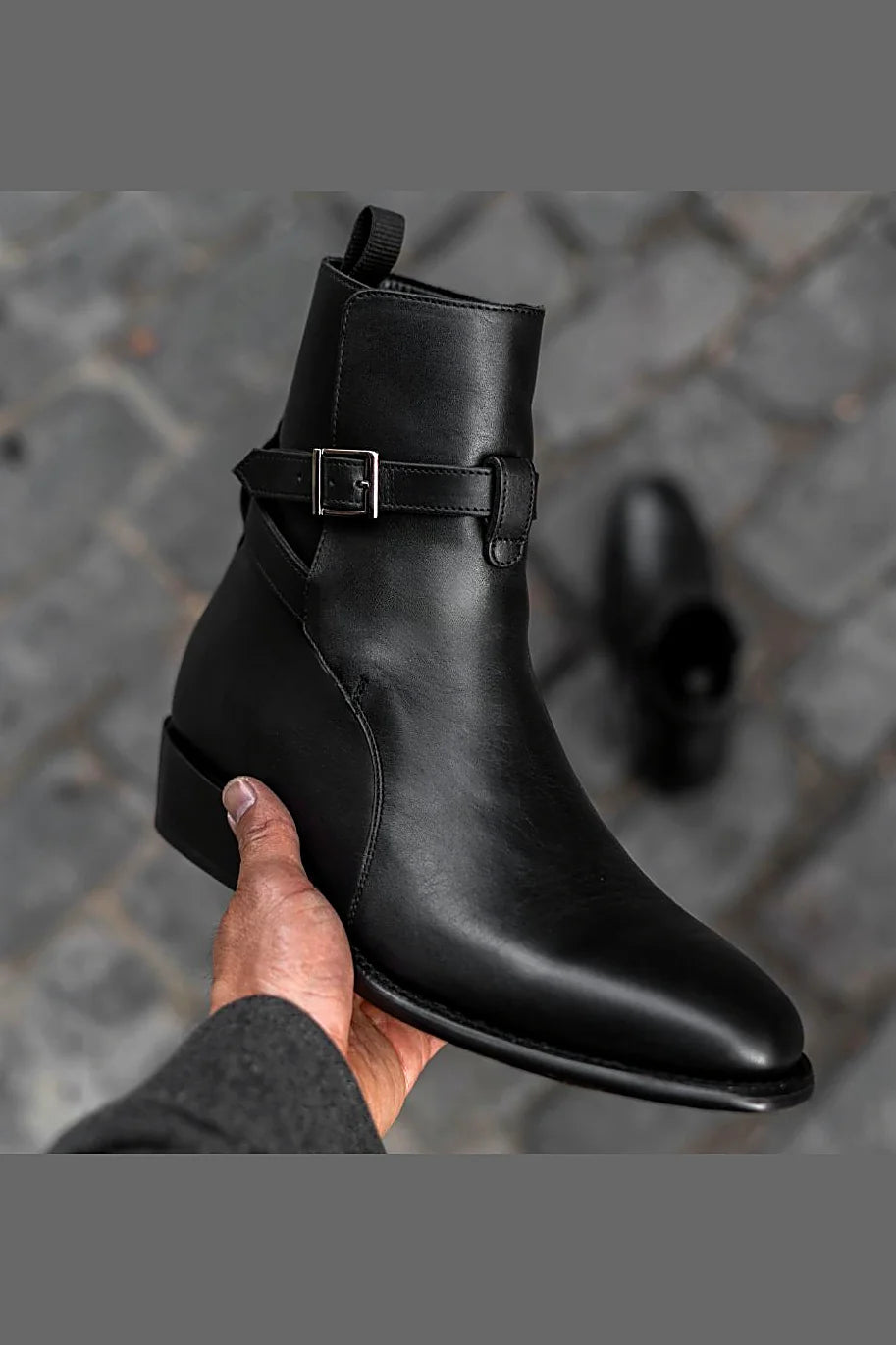 Black buckle boot