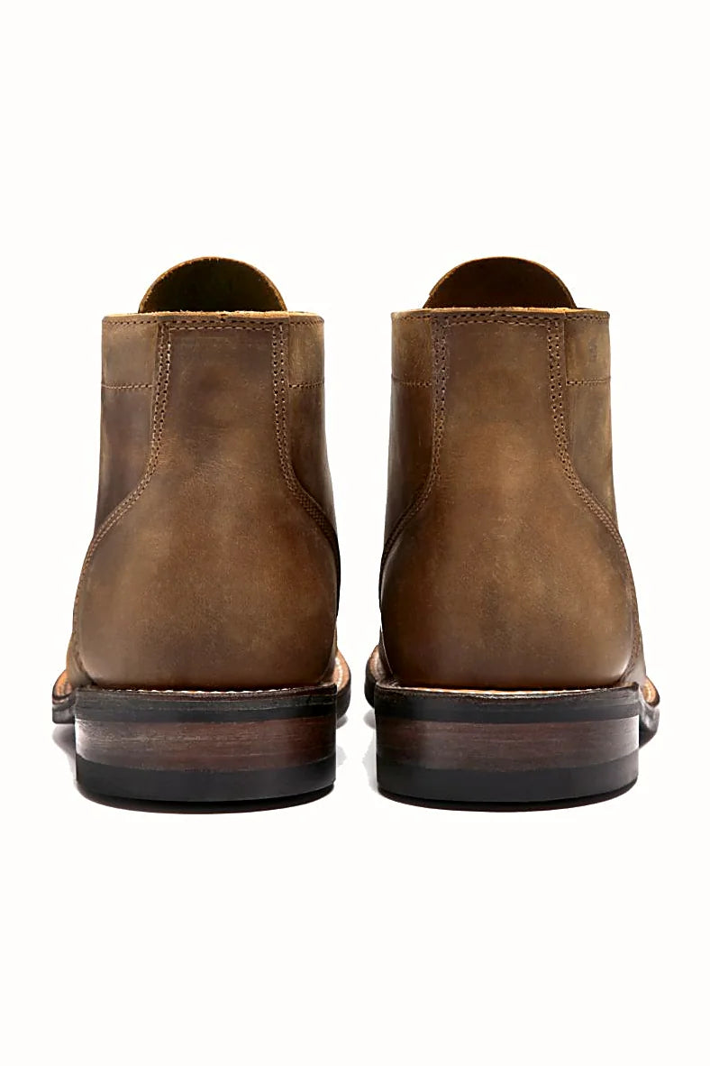 Copper-toned boot with leather laces